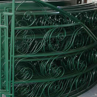 Intricate scroll‑pattern steel decorative sections for greenhouse facade
