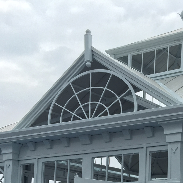 Fan-shaped wrought steel decorative gable detail on Victorian conservatory roof peak