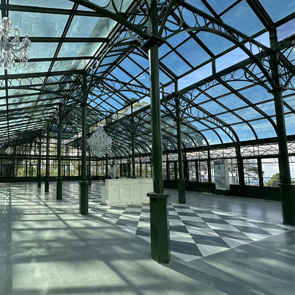 Spacious interior inside Victorian glass greenhouse sunroom venue