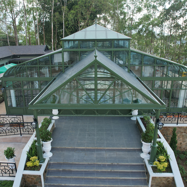 Aerial view of multi-level Victorian glass greenhouse sunroom