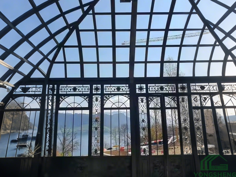 Decorative glass window frame YSGH‑052 victorian curved orangerie overlooking lake and mountain scenery