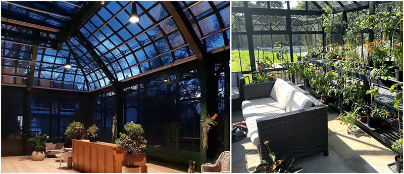 Cozy seating area inside a custom Victorian greenhouse, surrounded by ferns and flowers
