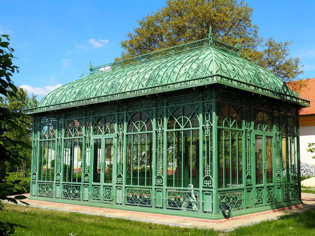 Green vintage Victorian conservatory, hot-dip galvanized steel frame, decorative arched metal grille, garden glass house