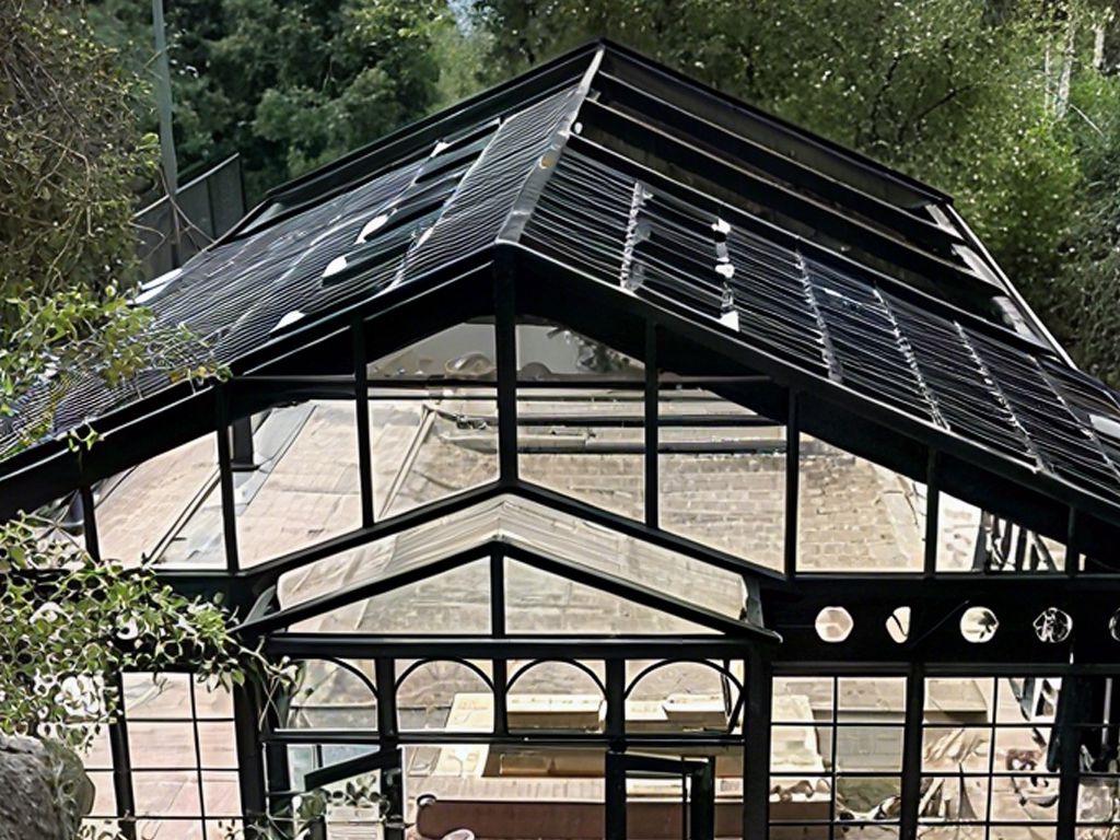 Close‑up victorian conservatory gable roof and front glass facade