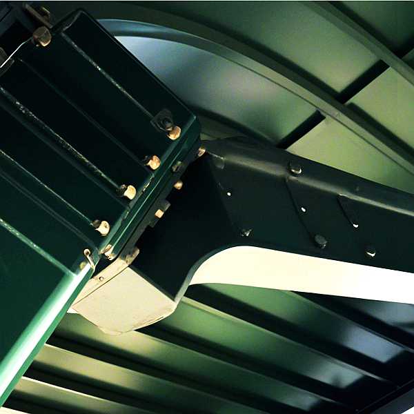 Close-up structural bolted joint of hot-dip galvanized steel frame for Victorian glass conservatory