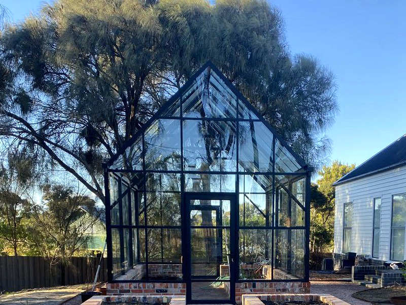 Black powder coated aluminum Victorian gable greenhouse with tempered glass, backyard garden planting structure
