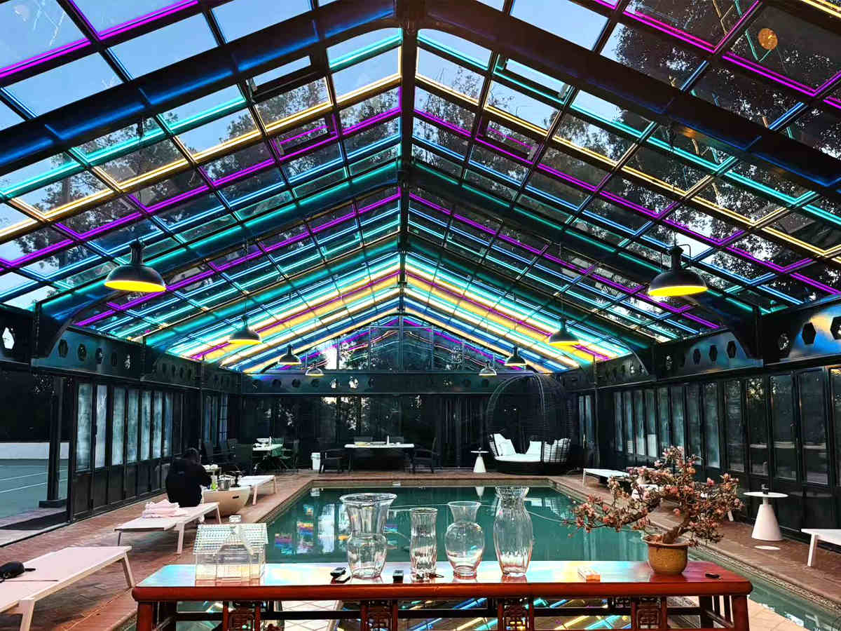 Greenhouse with Pool in LA: Retro Glass Box Meets Neon Nights