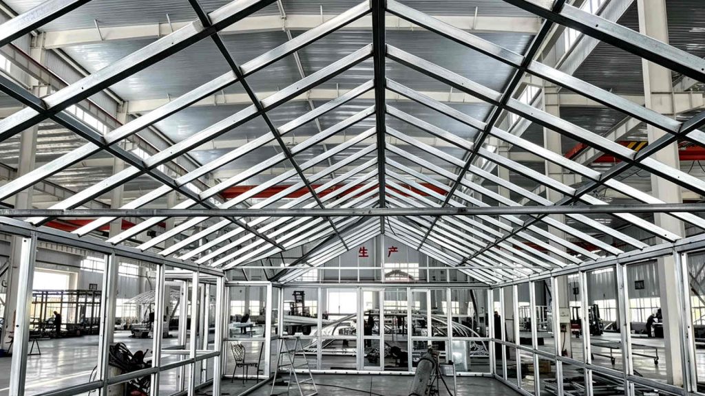 L15W6H4m gable roof greenhouse steel frame interior during factory trial assembly for Malta.