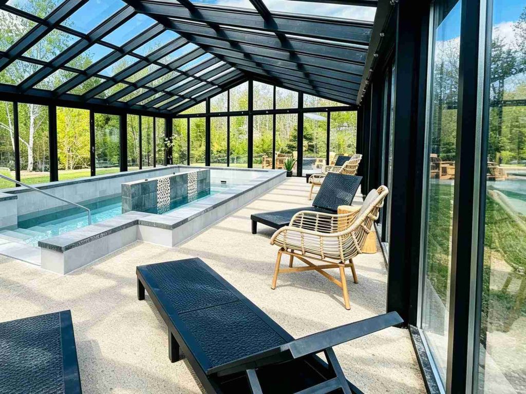 Black frame minimalist pool sunroom with Low-E glass roof and enclosed swimming pool